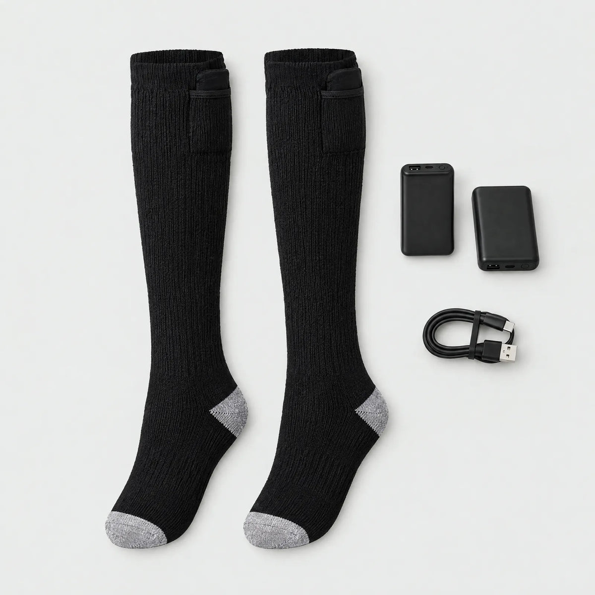 Lieferumfang: ein Paar beheizte Kniestrümpfe, zwei Akkus und USB-Ladekabel