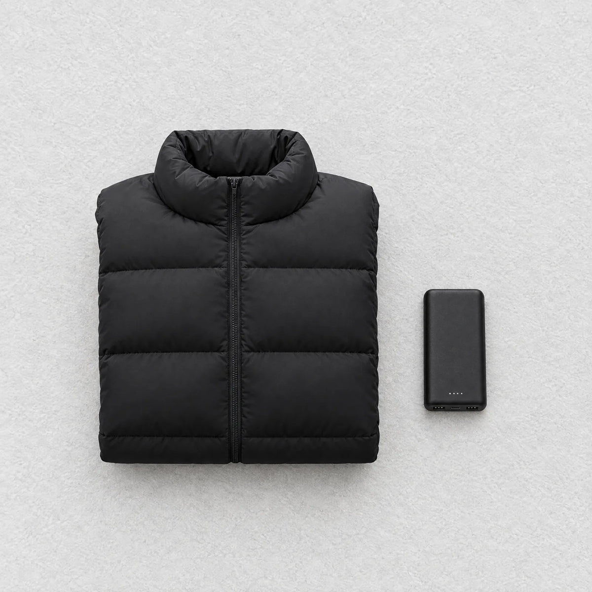 Lieferumfang: beheizte Steppjacke und Powerbank 5.000 mAh